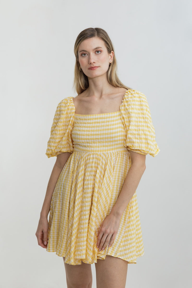 yellow babydoll dress Sassy Shortcake Bowshine Mini Be the life of the party in this strapless twist front babydoll dress Viscose and cotton dress BABYDOLL